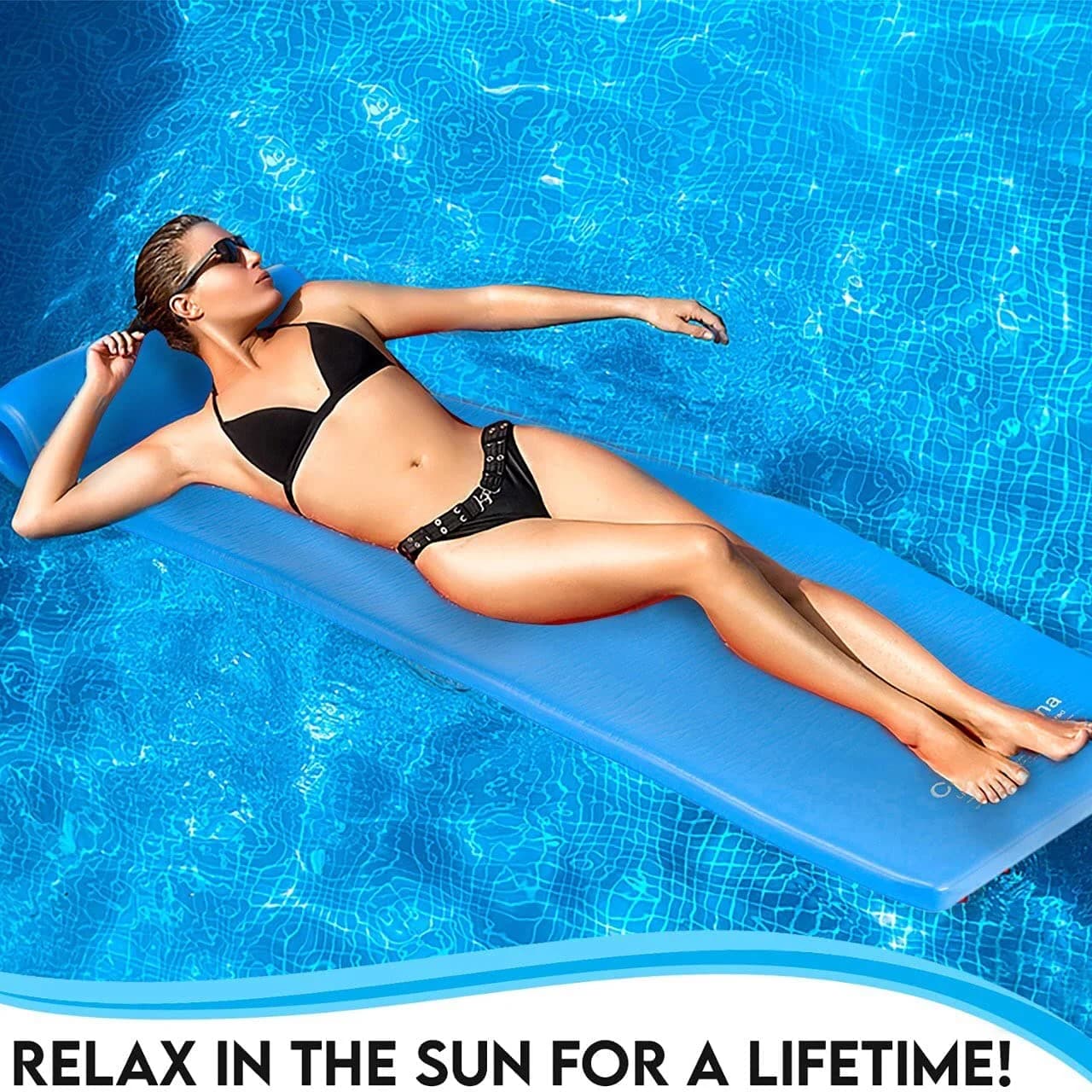 Woman lounging on a Cococabana blue foam pool float in a sunlit pool
